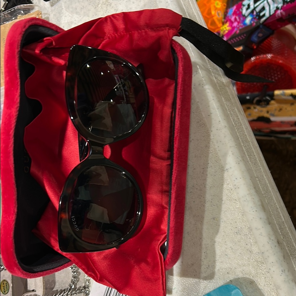 Black Sunglasses with Red Case